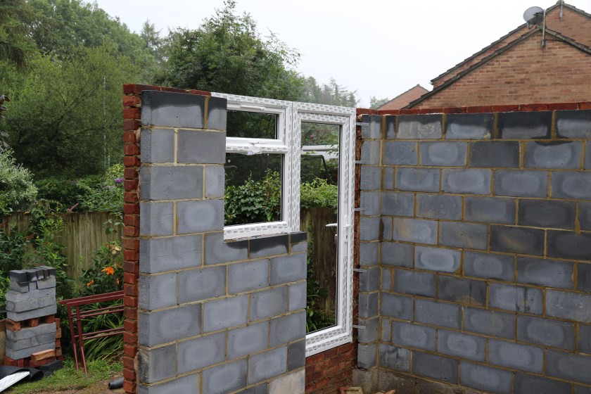 Conservatory - Utility Room door and window frames are in