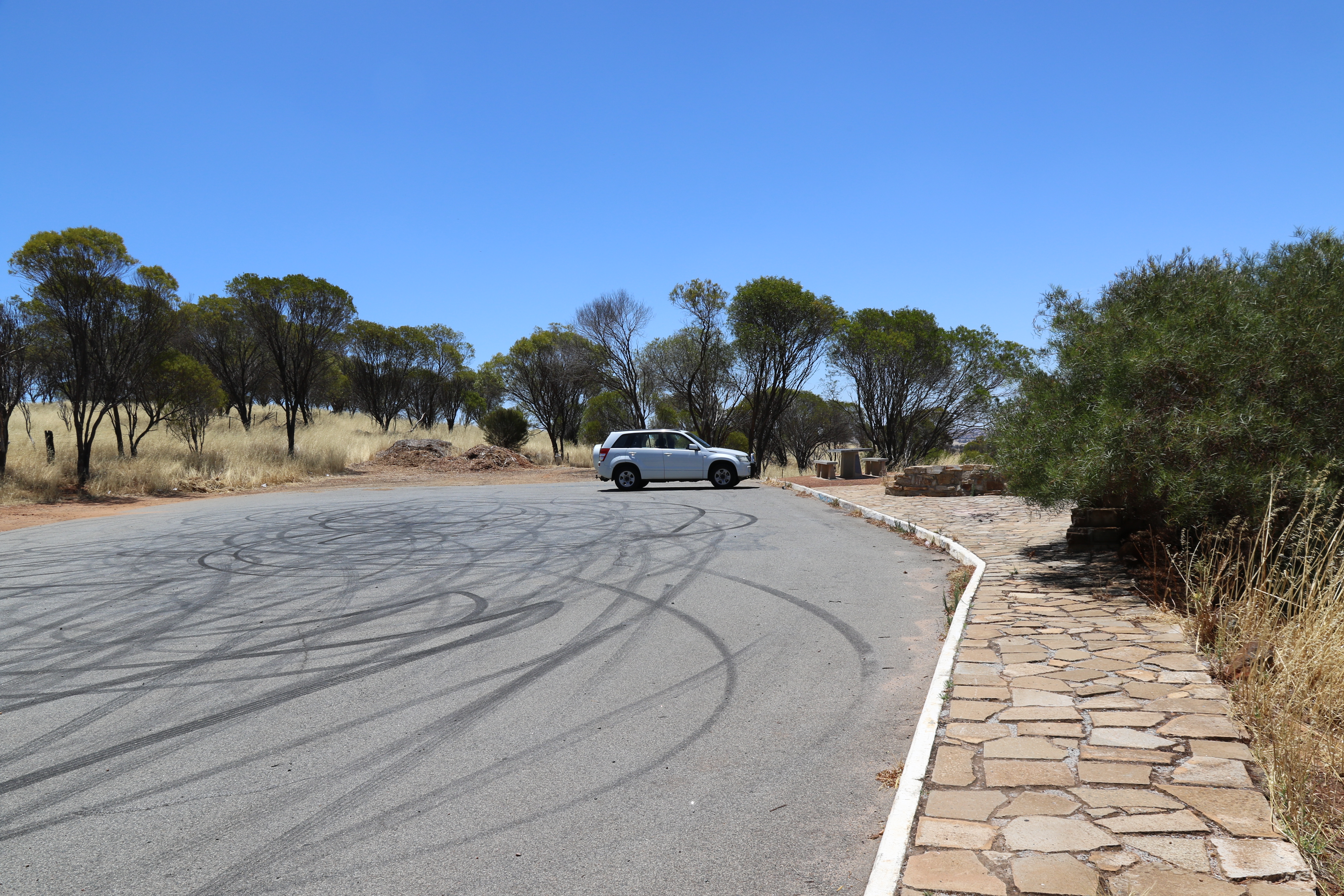 After several do-nuts, I managed to get the son-in-laws car perfectly parked. As you can see now the smoke has cleared.